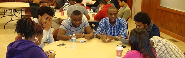 group of students around table